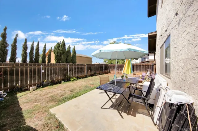 a view of a chairs and tables in the patio