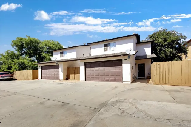 a view of a house with a garage