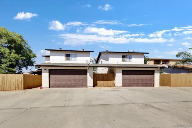 a kitchen with stainless steel appliances granite countertop a stove and a kitchen view