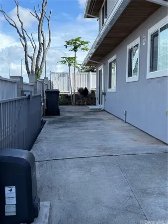 a view of a house with a tree
