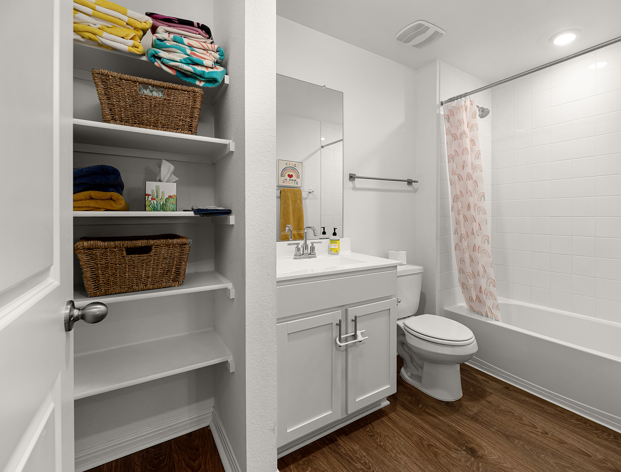 165 Santa Rosa Lane Buda, TX 78610 - Photo 13 of 21 a bathroom with a sink toilet a mirror and shower