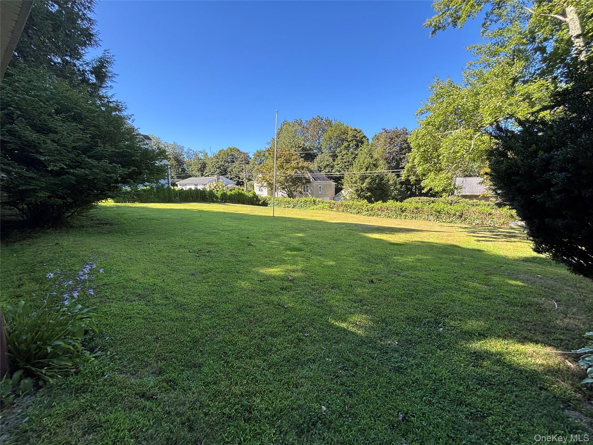 4 Lottie Road Carmel, NY 10512 - Photo 5 of 16 a view of field with trees in the background