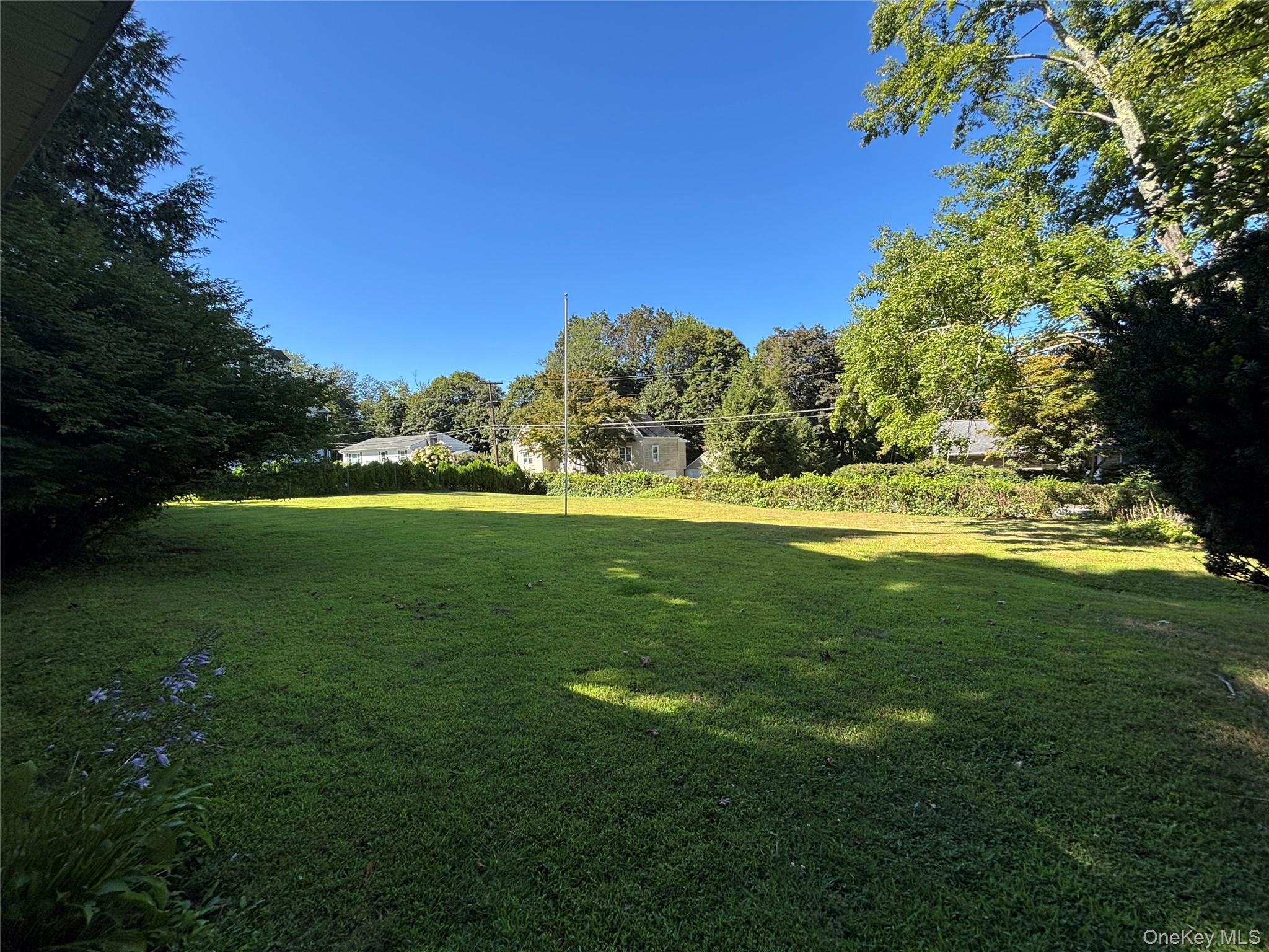 4 Lottie Road Carmel, NY 10512 - Photo 9 of 16 a yard with lots of green space and a lake view