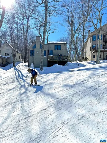 a view of a backyard of the house
