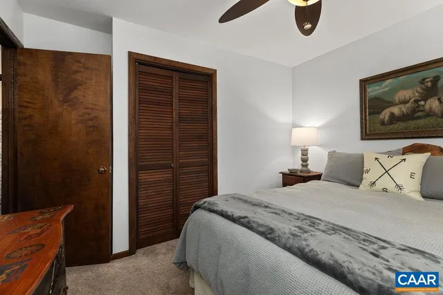 a bathroom with a sink toilet a shower and a mirror