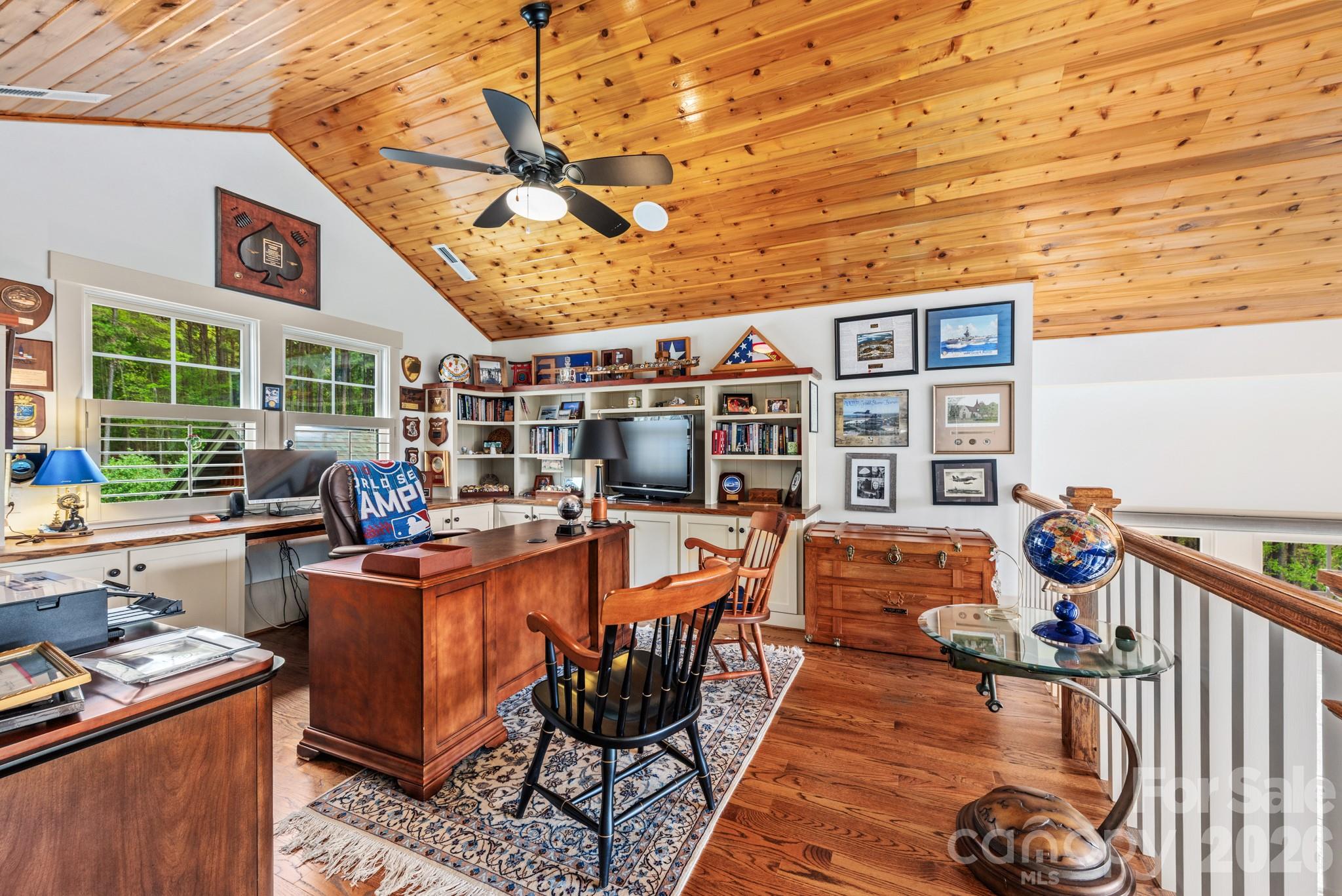 18321 Rosapenny Road Charlotte, NC 28278 - Photo 19 of 40 a living room with furniture a wooden floor and next to a window