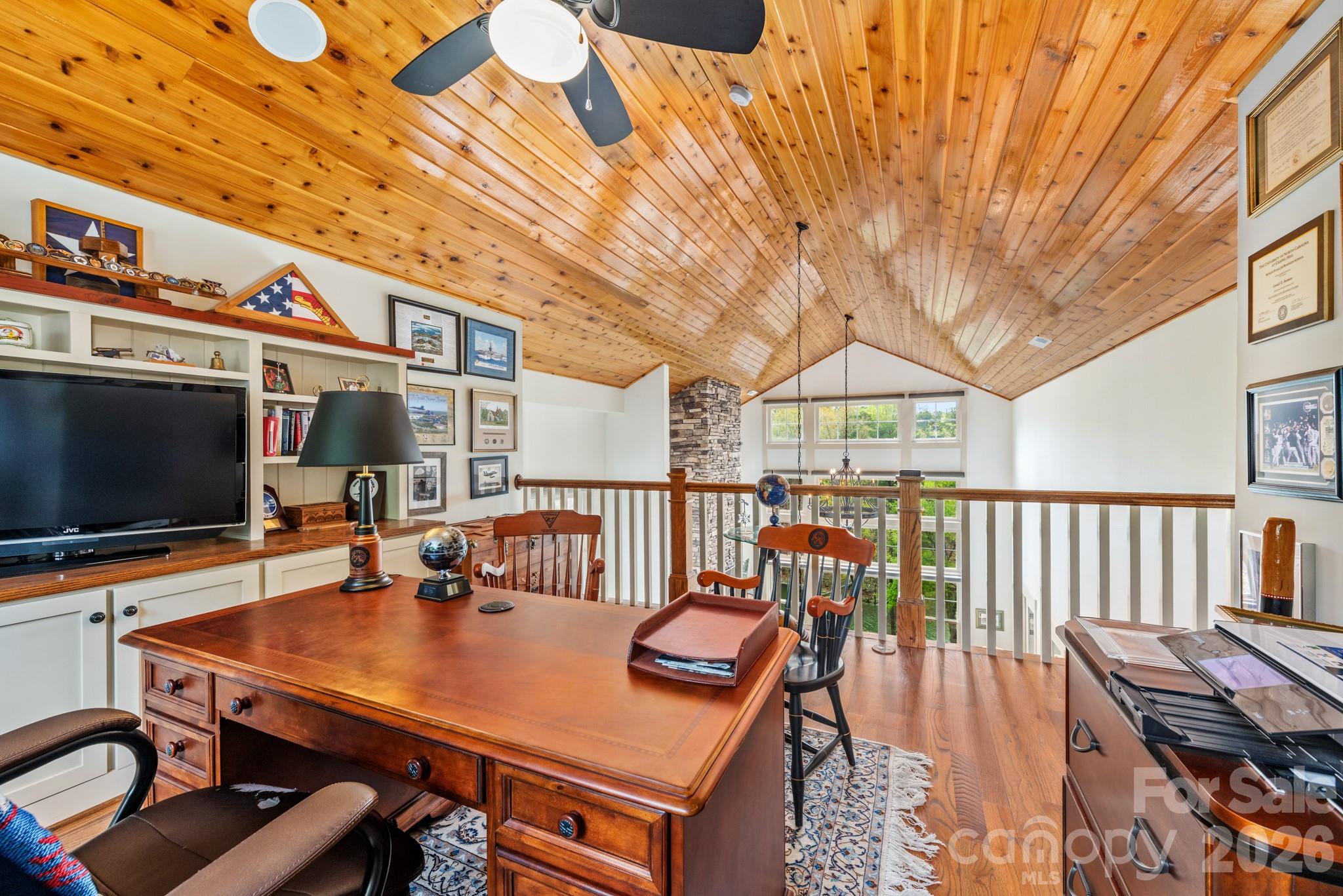 18321 Rosapenny Road Charlotte, NC 28278 - Photo 20 of 40 a view of a patio with a table chairs and a barbeque