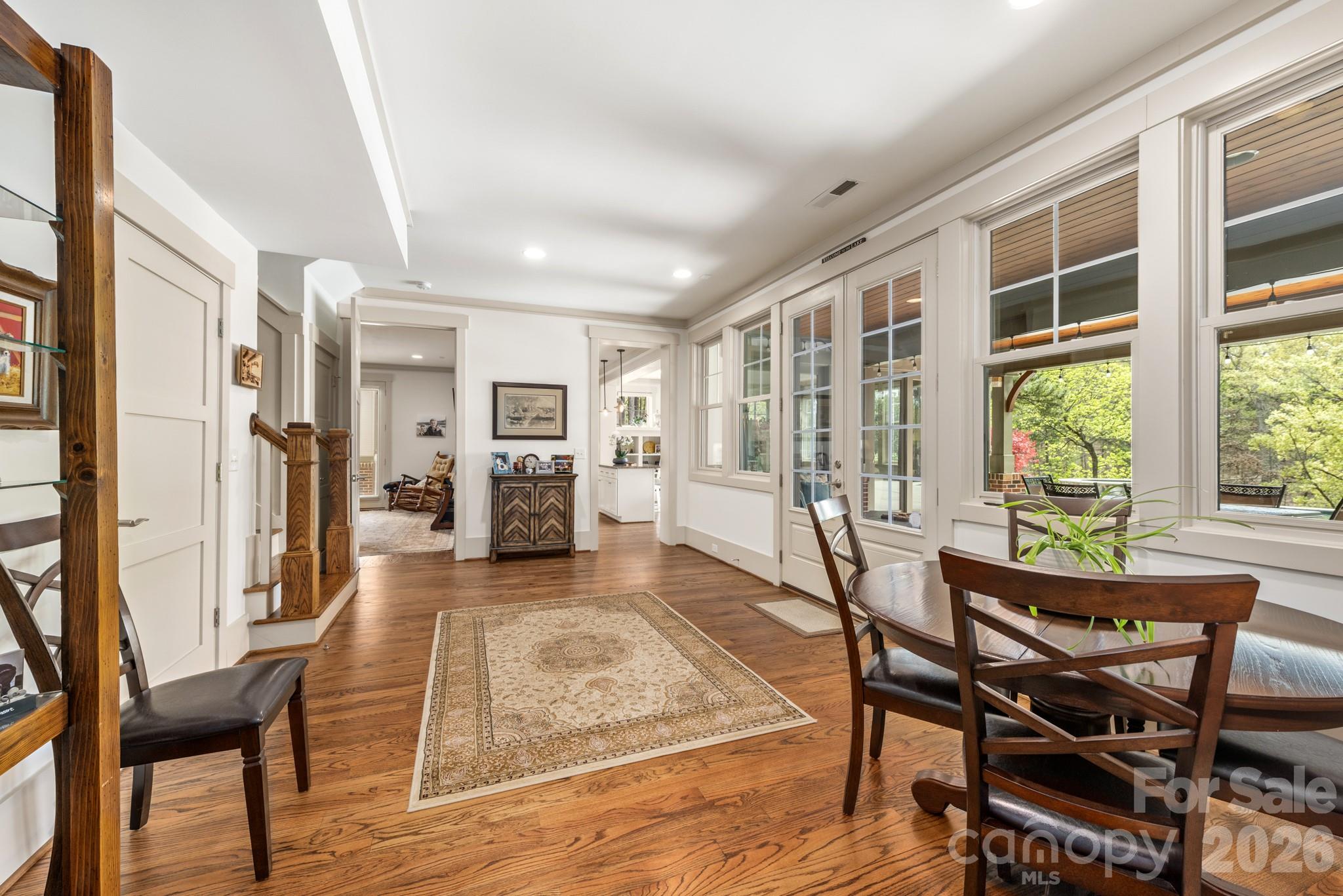 18321 Rosapenny Road Charlotte, NC 28278 - Photo 29 of 40 a view of a livingroom with furniture wooden floor and windows