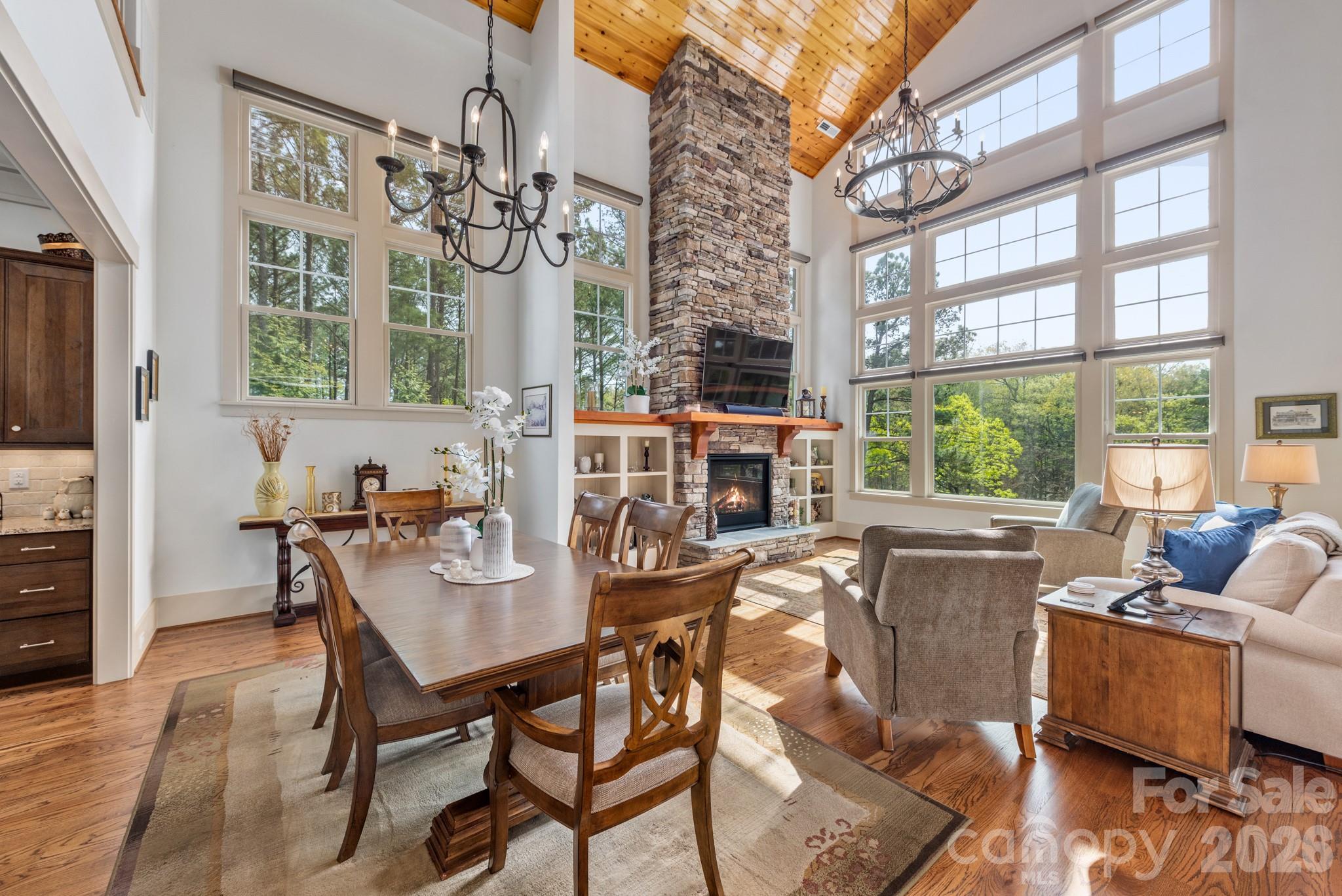 18321 Rosapenny Road Charlotte, NC 28278 - Photo 4 of 40 a living room with fireplace furniture and a large window