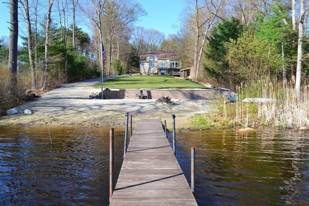 38 Lincoln Point Road Charlton, MA 01507 - Photo 4 of 25 a view of a swimming pool with a patio