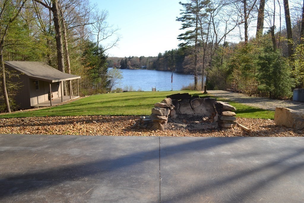 38 Lincoln Point Road Charlton, MA 01507 - Photo 6 of 25 a view of a house with backyard and trees