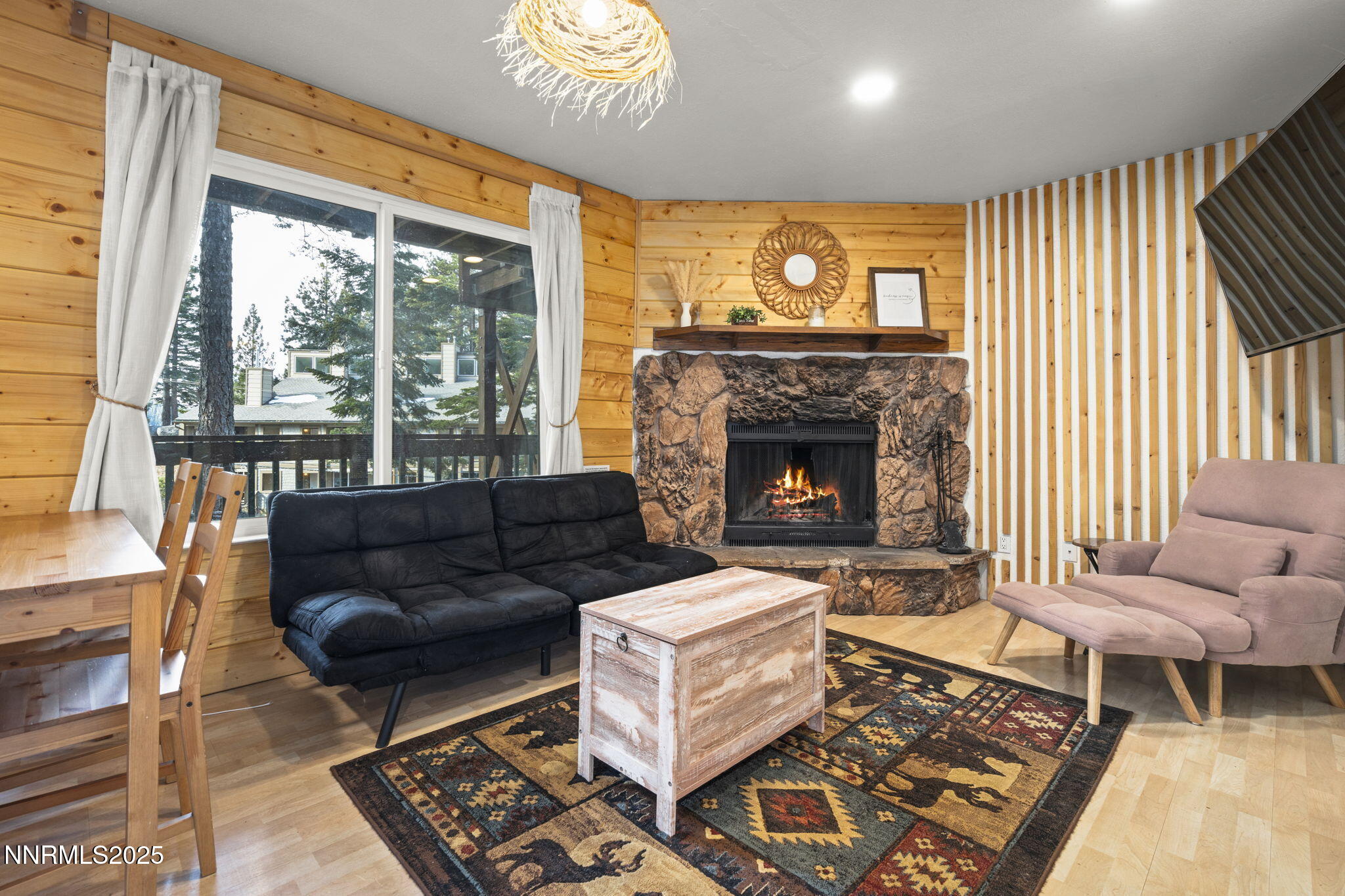 255 Tramway Drive, Unit 1B Stateline, NV 89449 - Photo 16 of 22 a living room with furniture and a fireplace