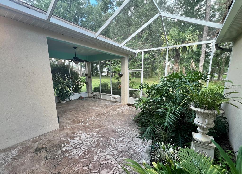 11097 Southwest 69th Circle Ocala, FL 34476 - Photo 14 of 16 a view of a backyard with garden