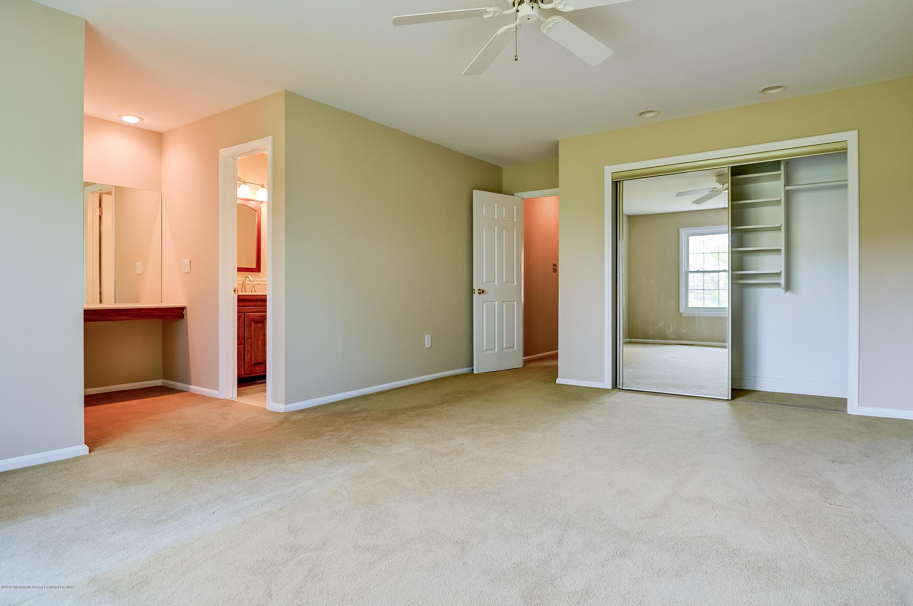 41 Apple Drive Spring Lake Heights, NJ 07762 - Photo 14 of 32 a view of an empty room with a bathroom