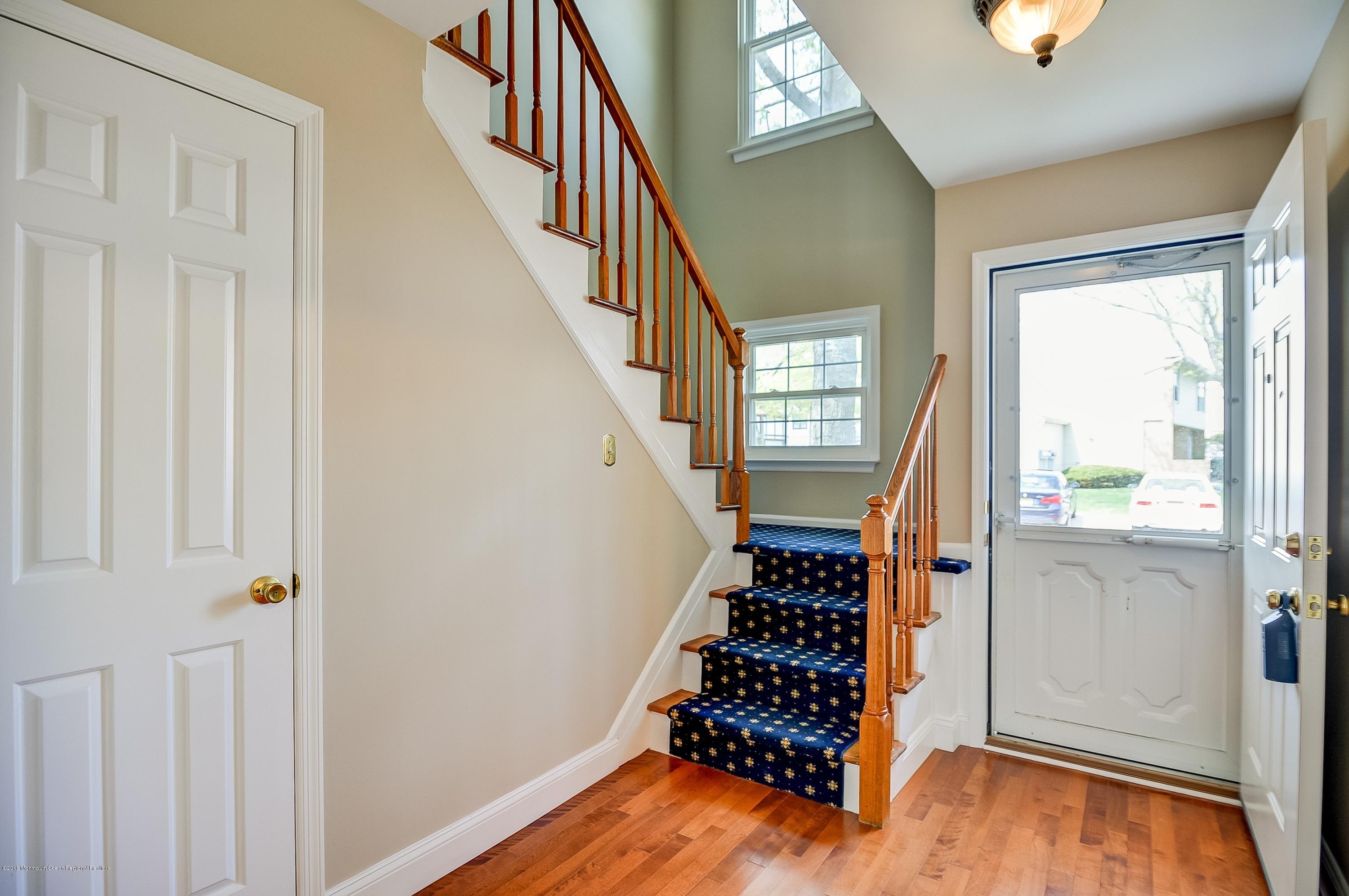 41 Apple Drive Spring Lake Heights, NJ 07762 - Photo 2 of 32 a view of entryway with wooden floor and stair