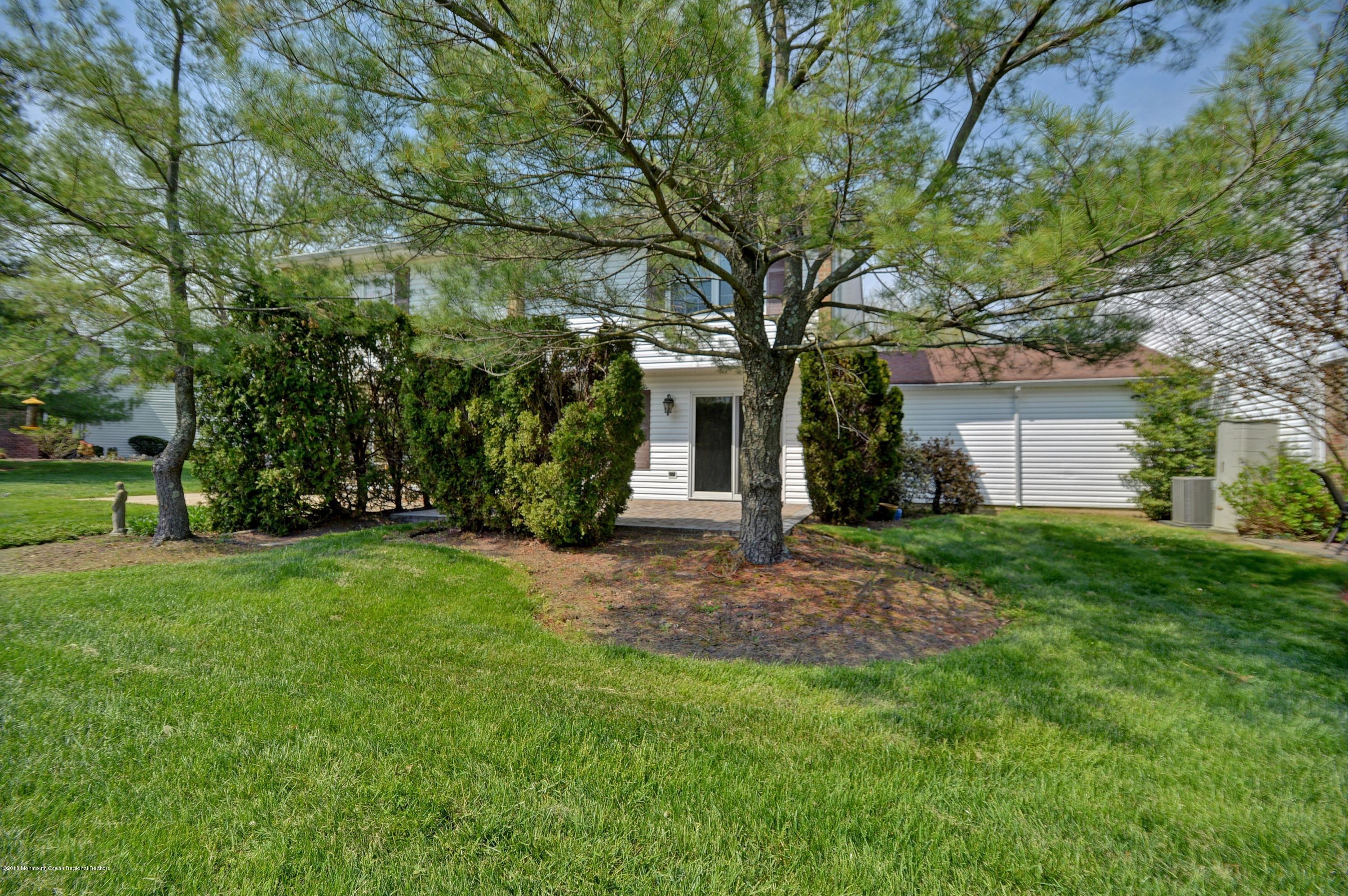41 Apple Drive Spring Lake Heights, NJ 07762 - Photo 25 of 32 front view of a house with a yard