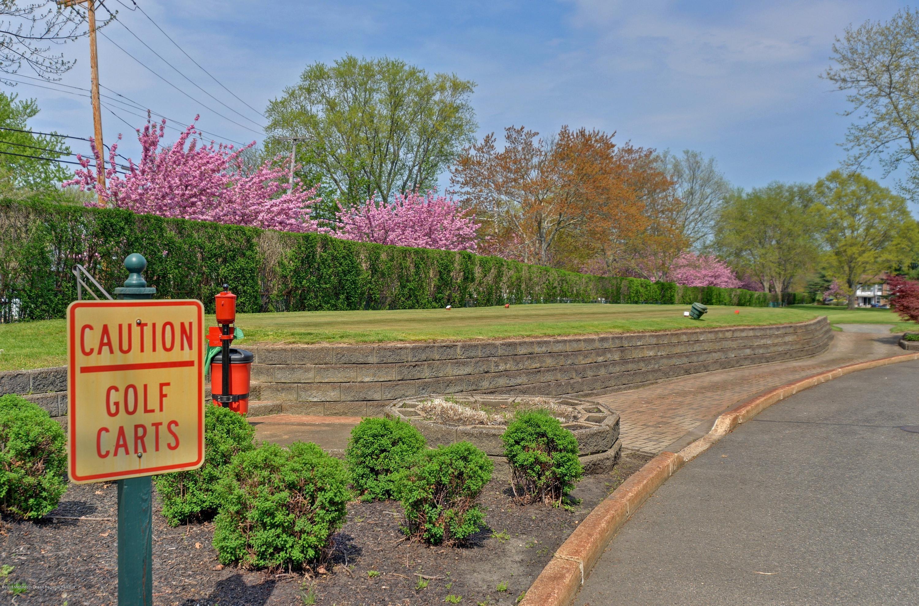 41 Apple Drive Spring Lake Heights, NJ 07762 - Photo 28 of 32 a sign board with parking space