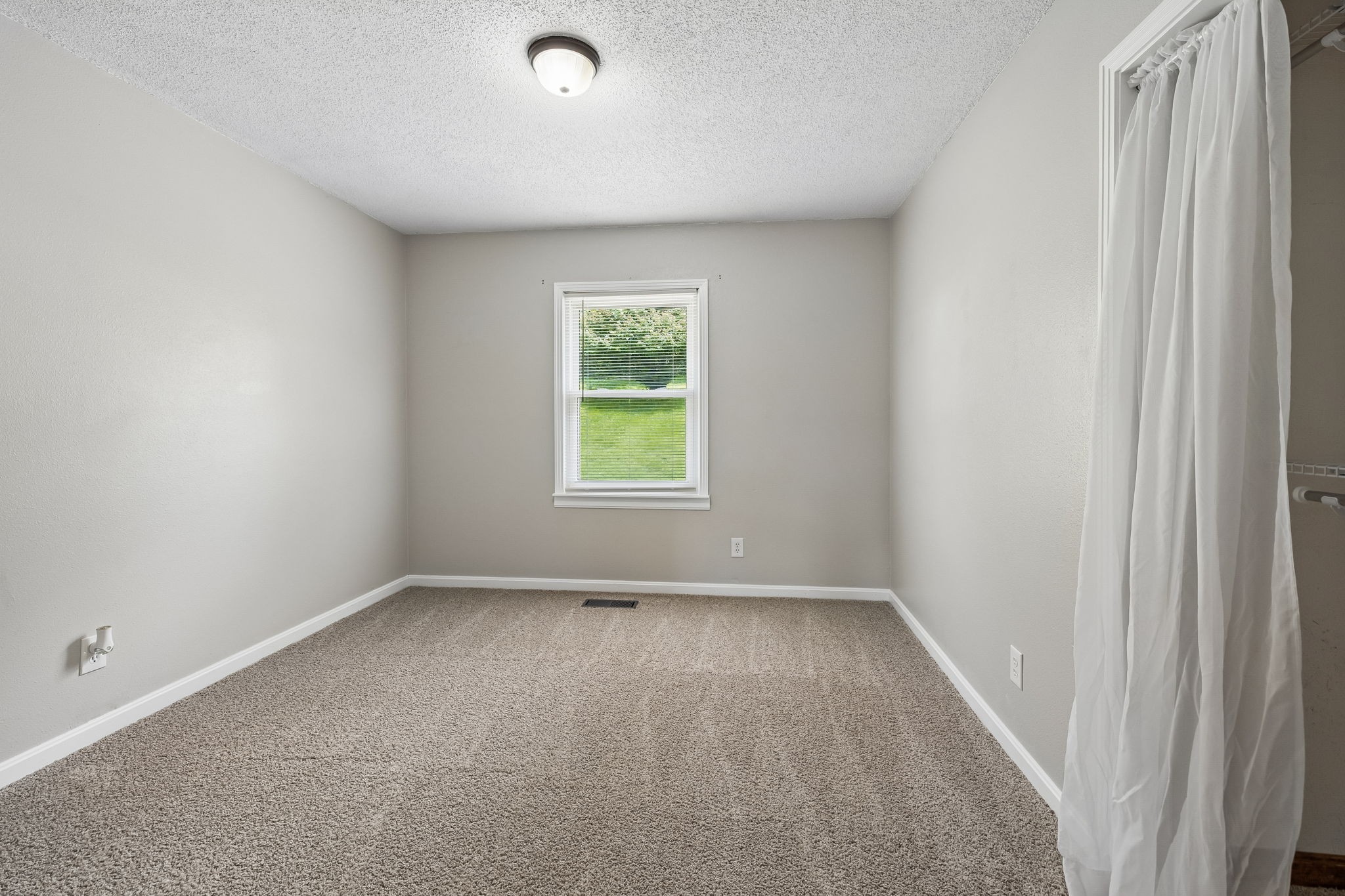14 Morris Lane Carthage, TN 37030 - Photo 30 of 31 an empty room with a window