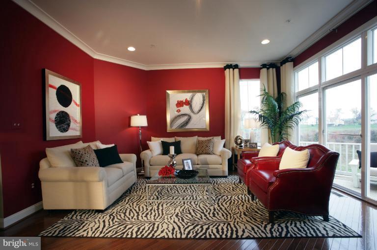 9839 Garden Ranges Laurel, MD 20723 - Photo 3 of 12 a living room with furniture and a large window