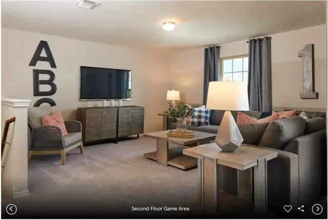 a bedroom with a large bed and a mirror