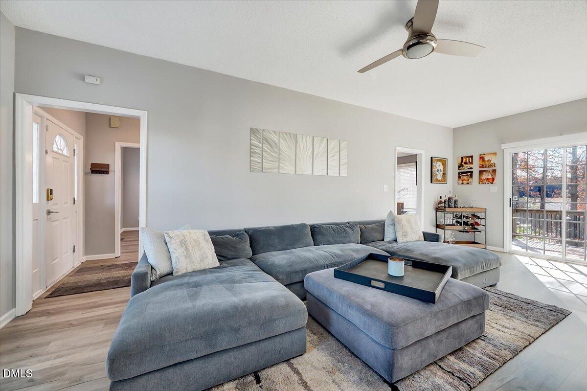 6900 Whittlesea Place Raleigh, NC 27616 - Photo 13 of 39 a living room with furniture and a rug