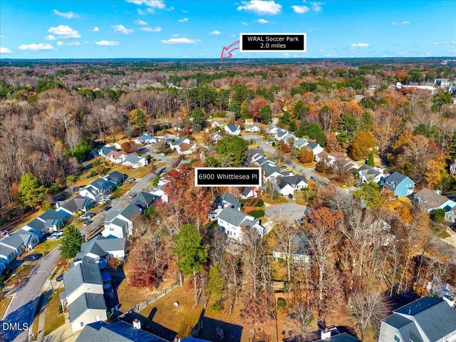a view of residential houses with outdoor space