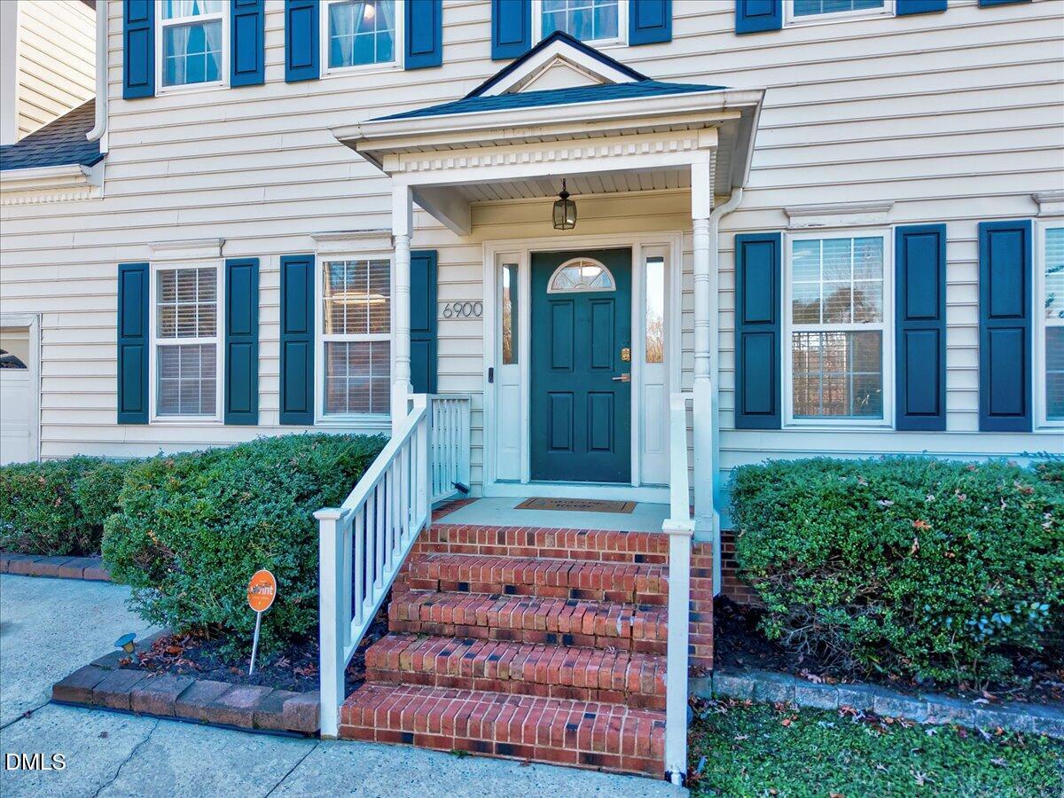 6900 Whittlesea Place Raleigh, NC 27616 - Photo 3 of 39 front view of a house with a porch
