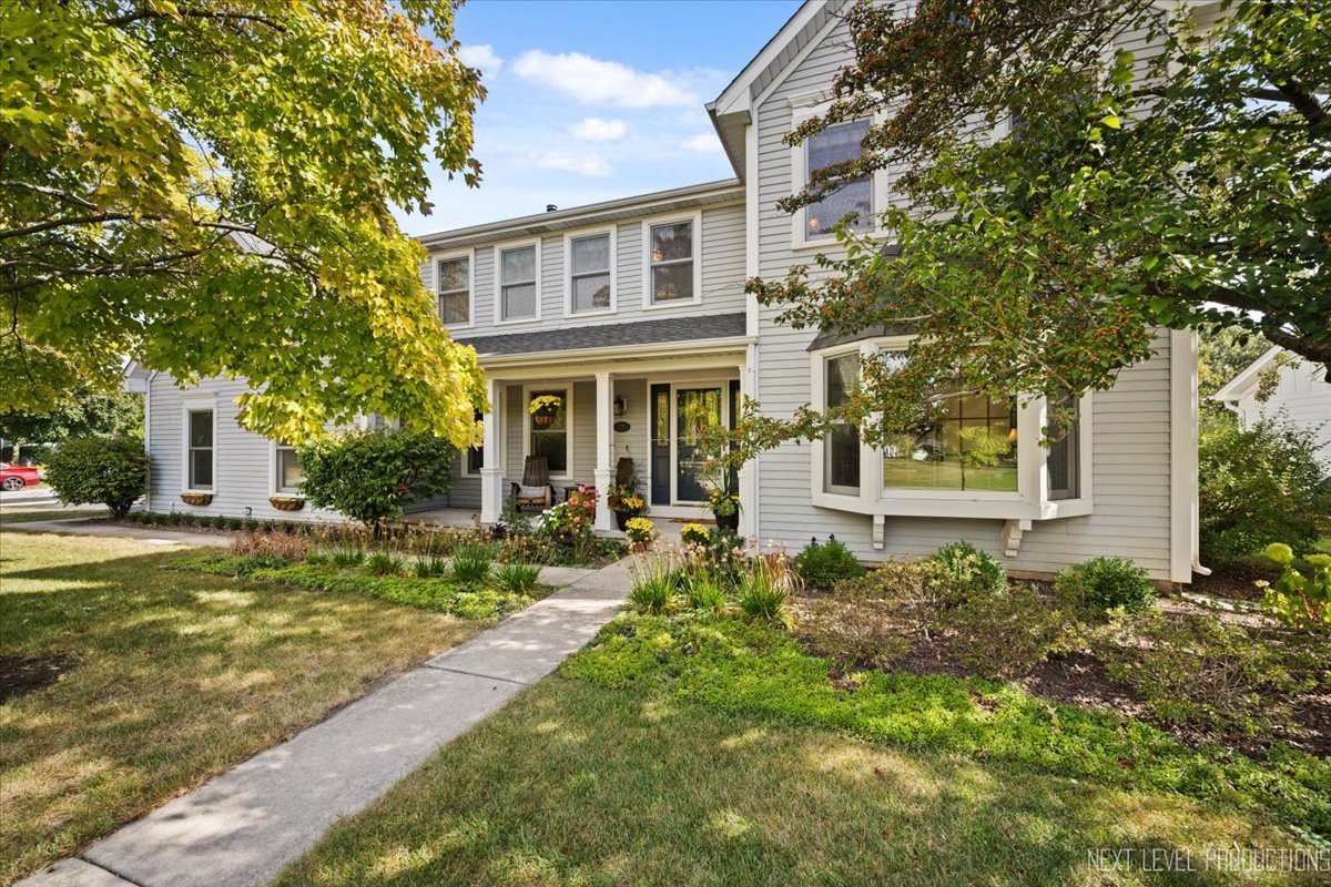78 South Stauffer Drive Naperville, IL 60540 - Photo 2 of 31 a front view of a house with a yard