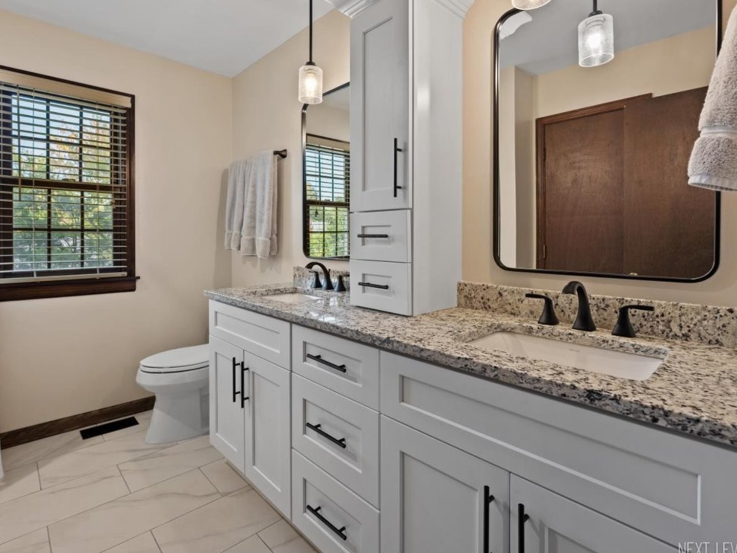 78 South Stauffer Drive Naperville, IL 60540 - Photo 25 of 31 a bathroom with a granite countertop sink mirror and a toilet