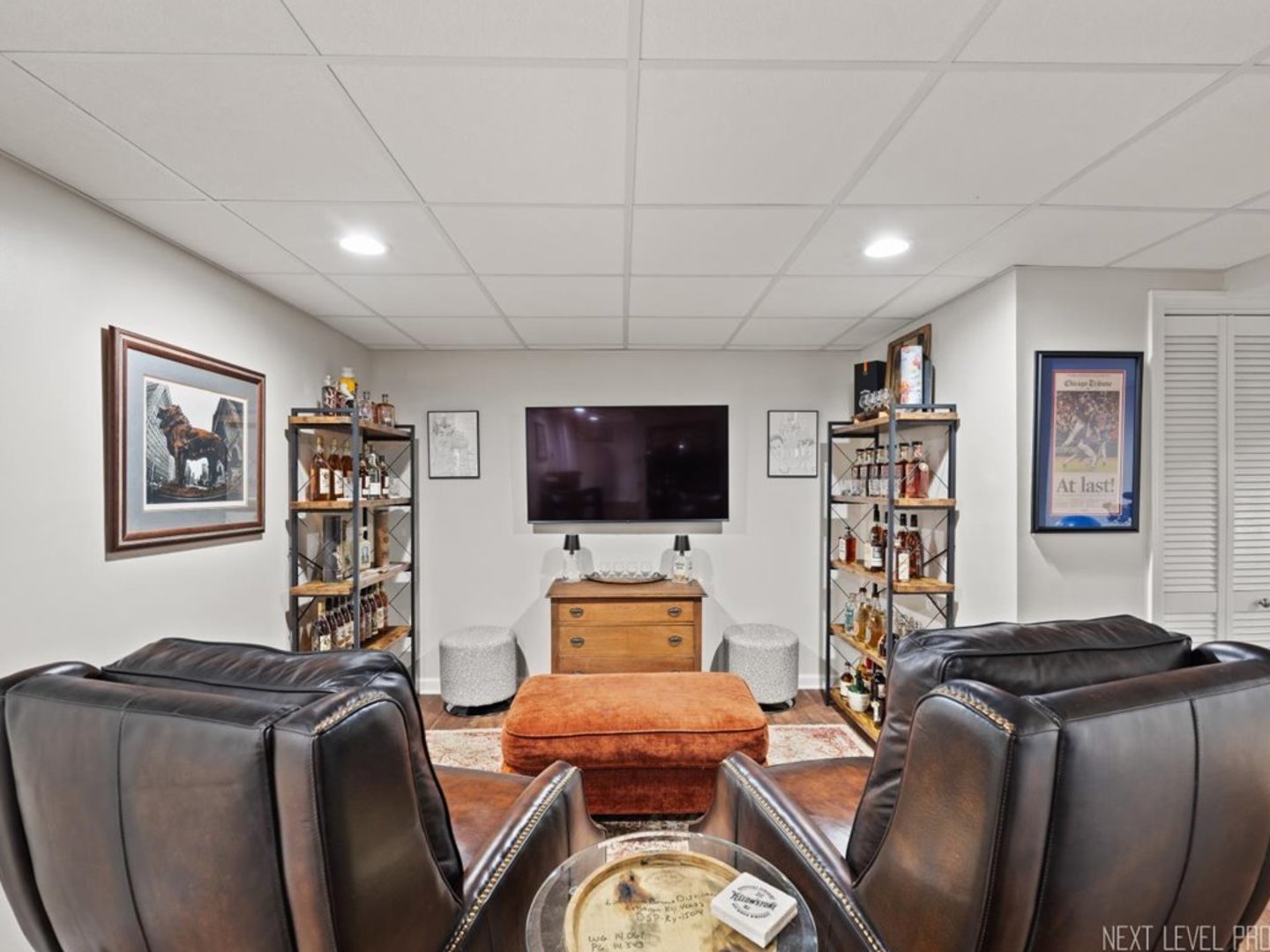 78 South Stauffer Drive Naperville, IL 60540 - Photo 27 of 31 a living room with furniture and a flat screen tv