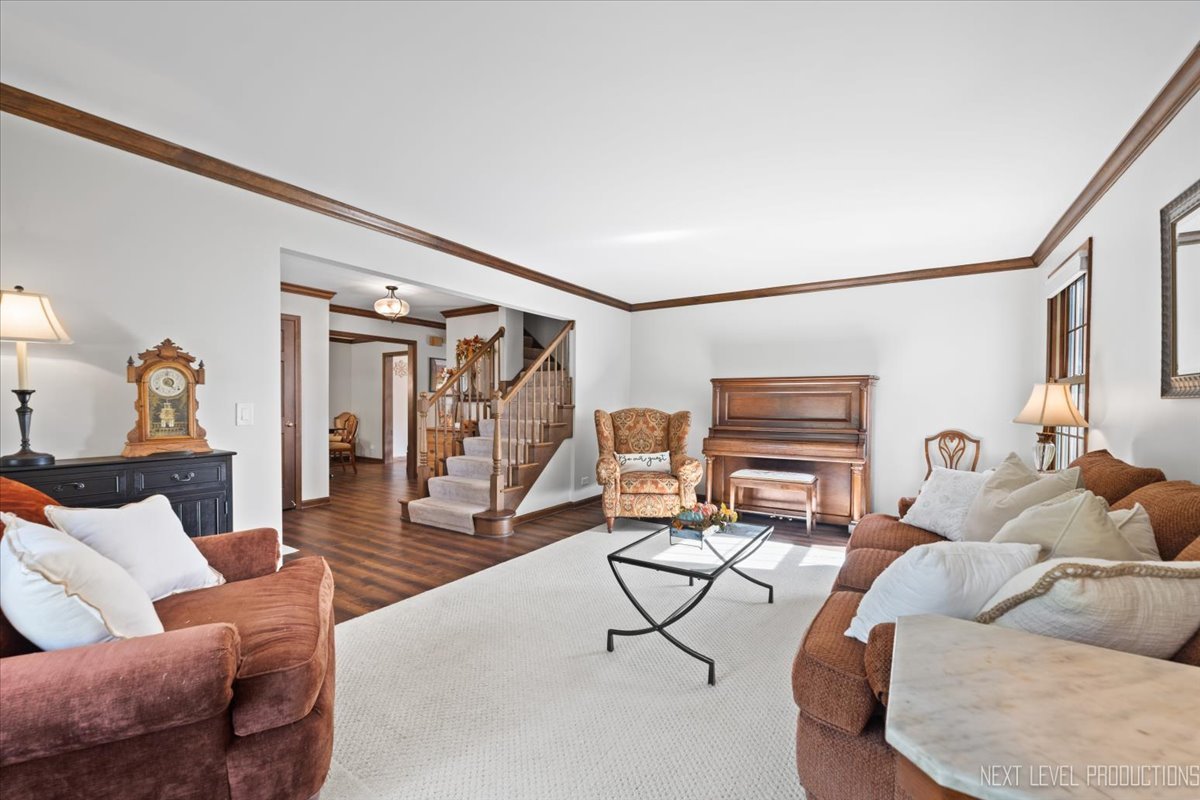 78 South Stauffer Drive Naperville, IL 60540 - Photo 5 of 31 a living room with furniture and a wooden floor