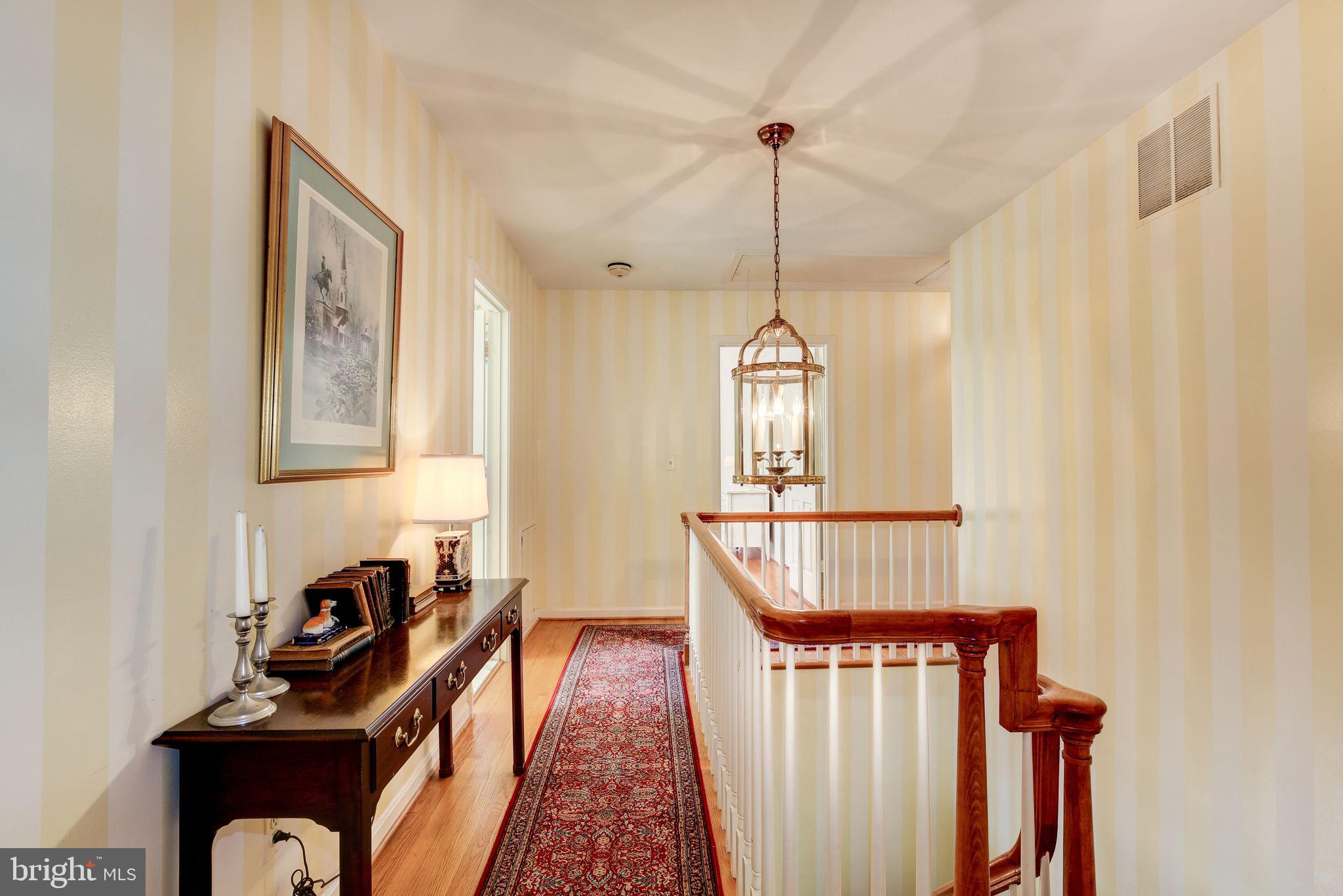 14709 Spring Meadows Drive Darnestown, MD 20874 - Photo 15 of 40 a view of a hallway with windows