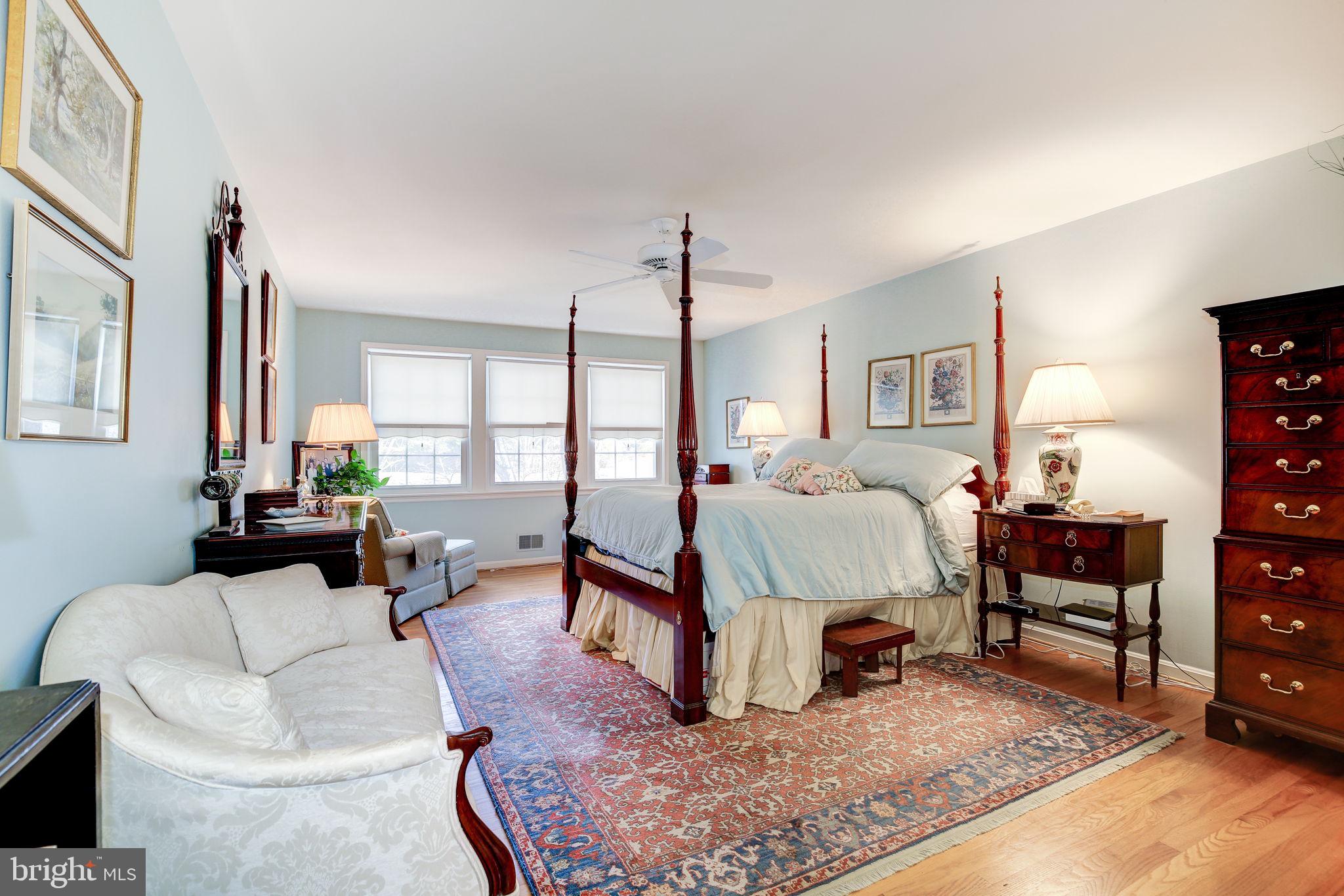 14709 Spring Meadows Drive Darnestown, MD 20874 - Photo 16 of 40 a bedroom with furniture and a large window