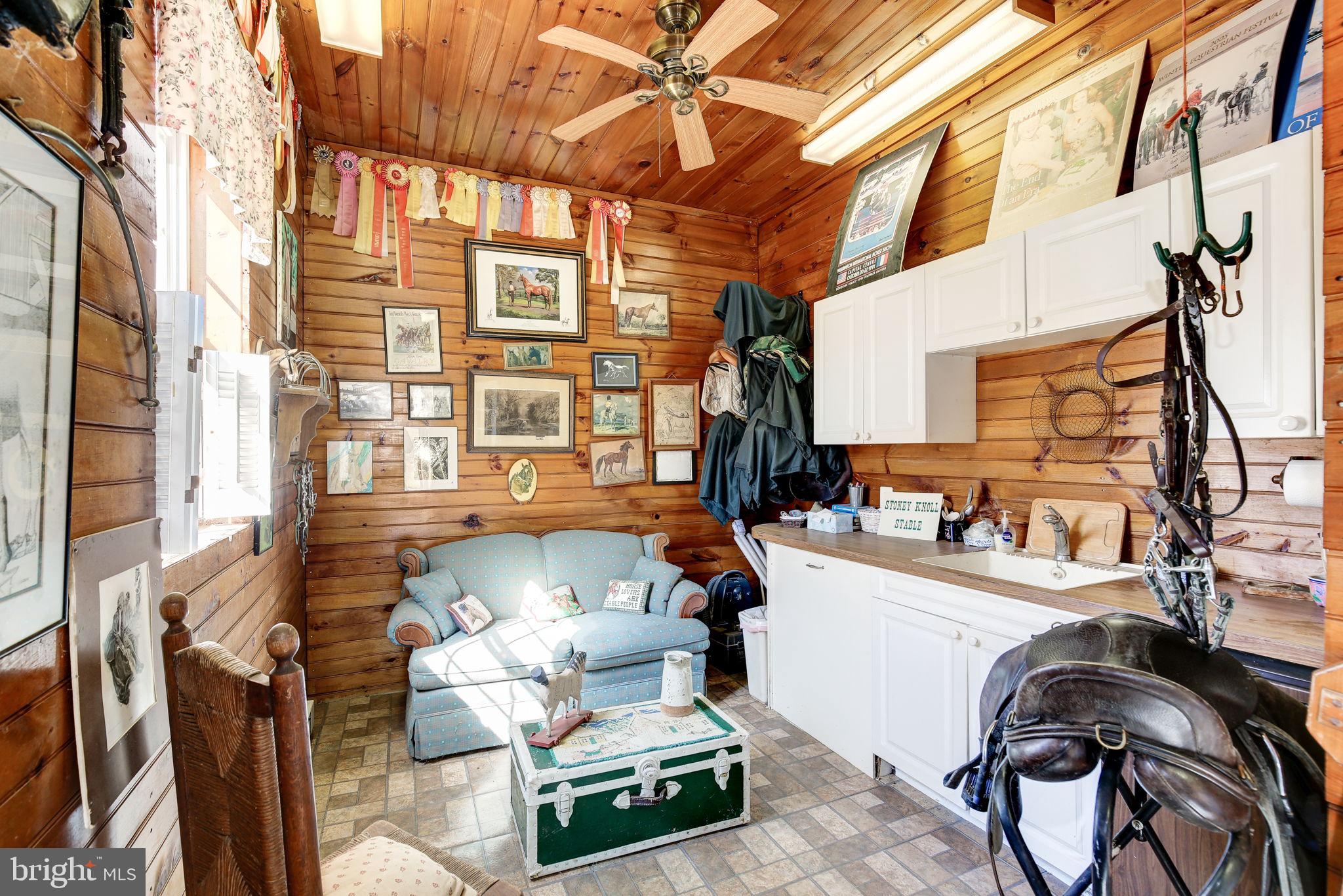 14709 Spring Meadows Drive Darnestown, MD 20874 - Photo 33 of 40 a living room with furniture a fireplace and next to a window