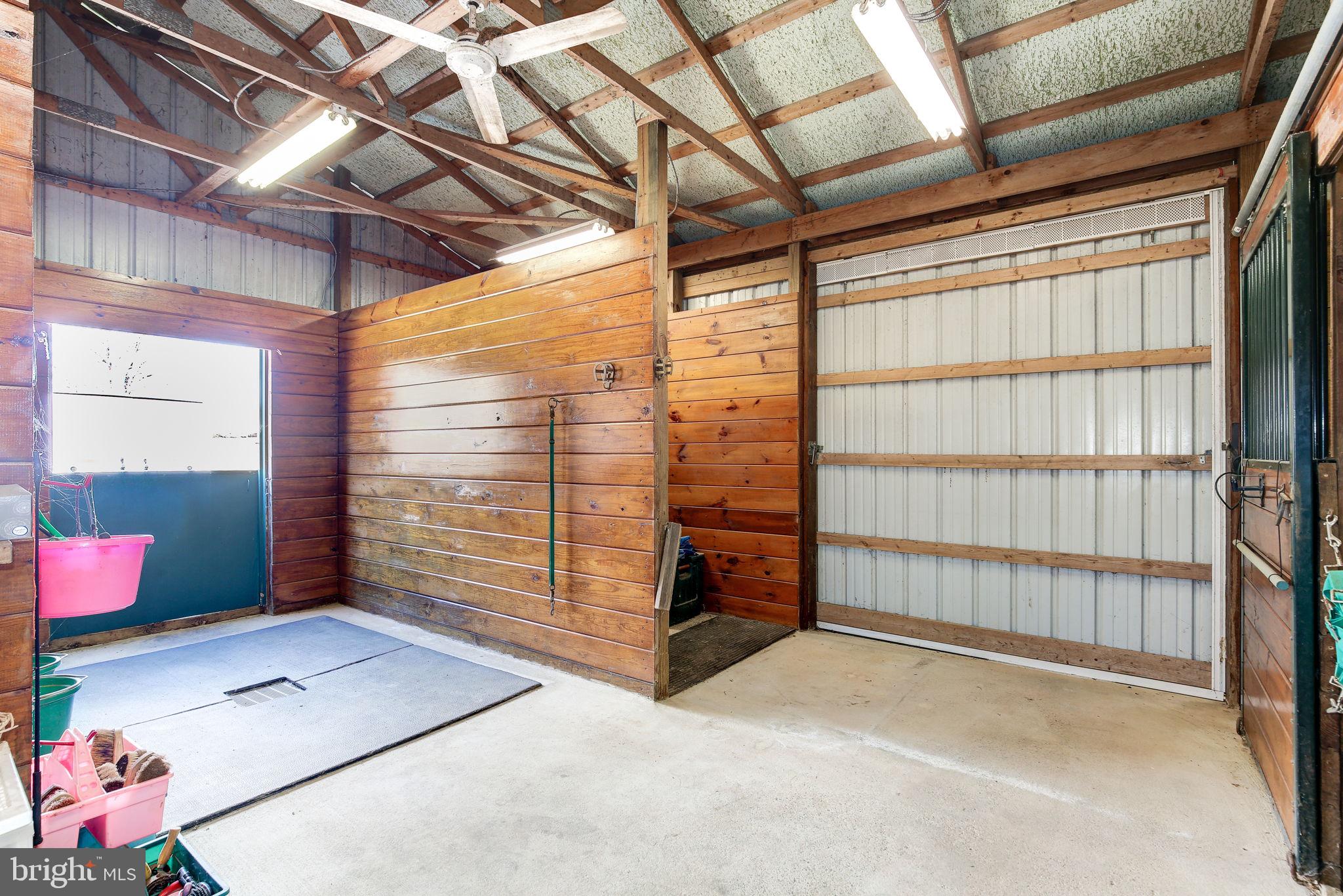 14709 Spring Meadows Drive Darnestown, MD 20874 - Photo 34 of 40 a view of empty room with wooden floor and windows