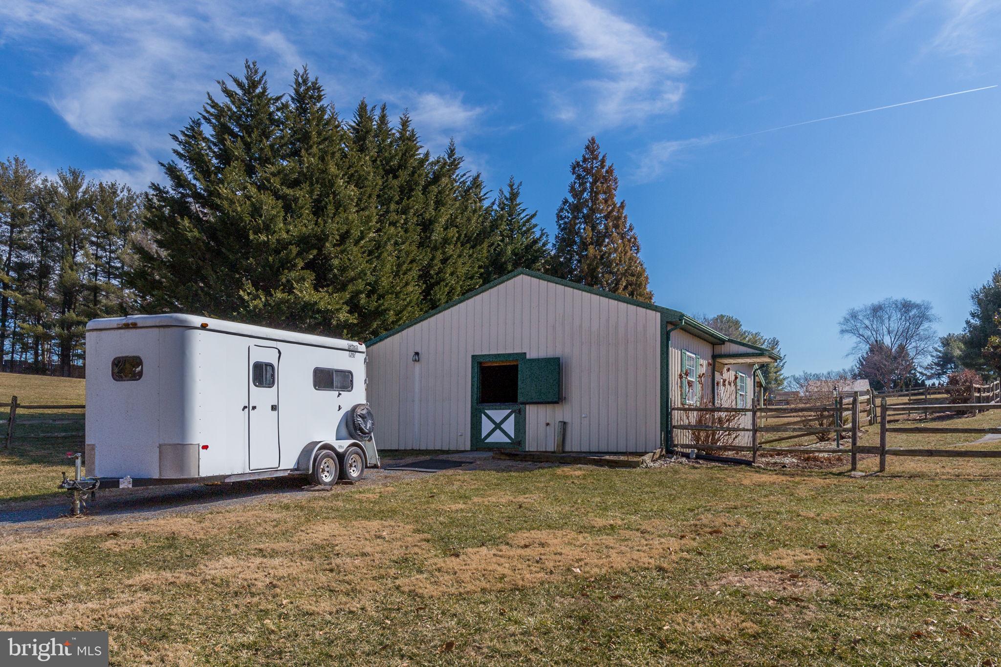 14709 Spring Meadows Drive Darnestown, MD 20874 - Photo 35 of 40 a view of a house with backyard and trees