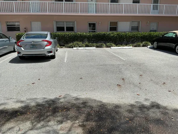 a car parked in front of a house