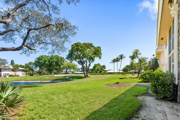 a view of a golf course with a garden