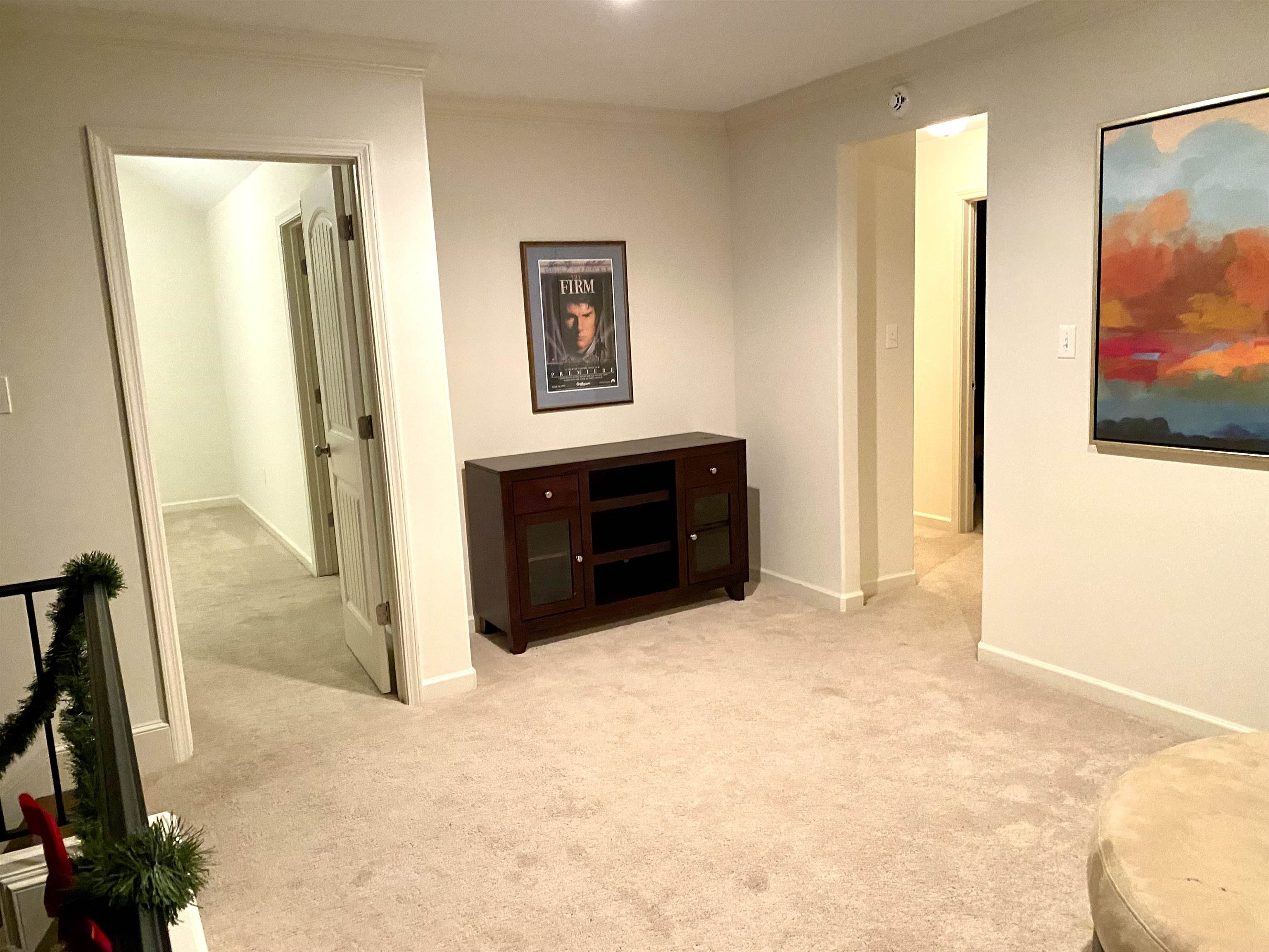 4713 Emmas Circle West Collierville, TN 38017 - Photo 16 of 25 a view of a room with a flat tv screen and a bathroom