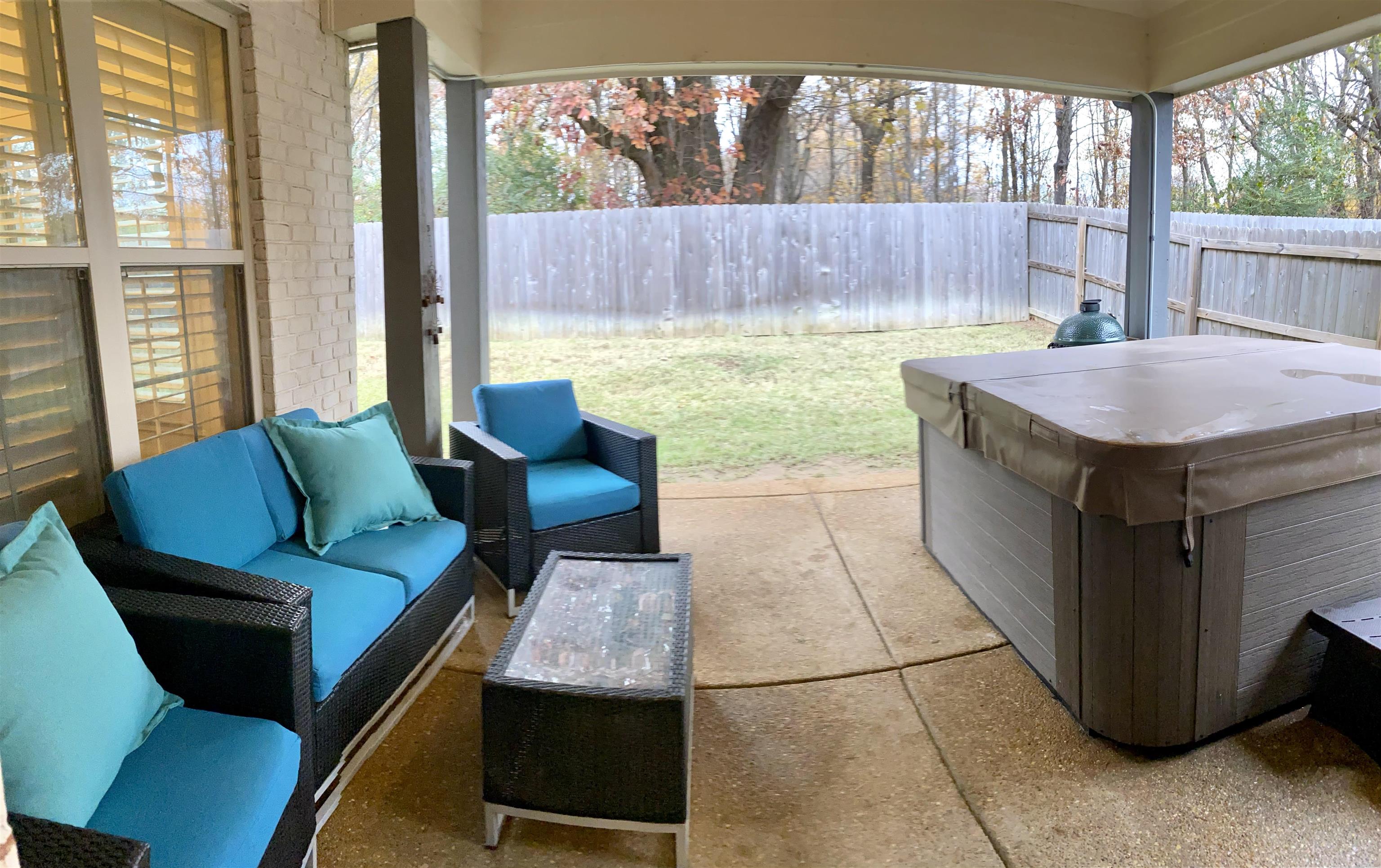 4713 Emmas Circle West Collierville, TN 38017 - Photo 23 of 25 a living room with a couch and a table