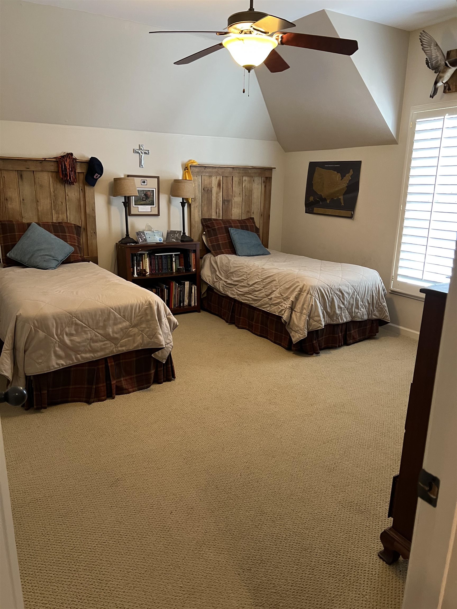5110 Barry Road Memphis, TN 38117 - Photo 15 of 25 a spacious bedroom with two beds and painting on the wall