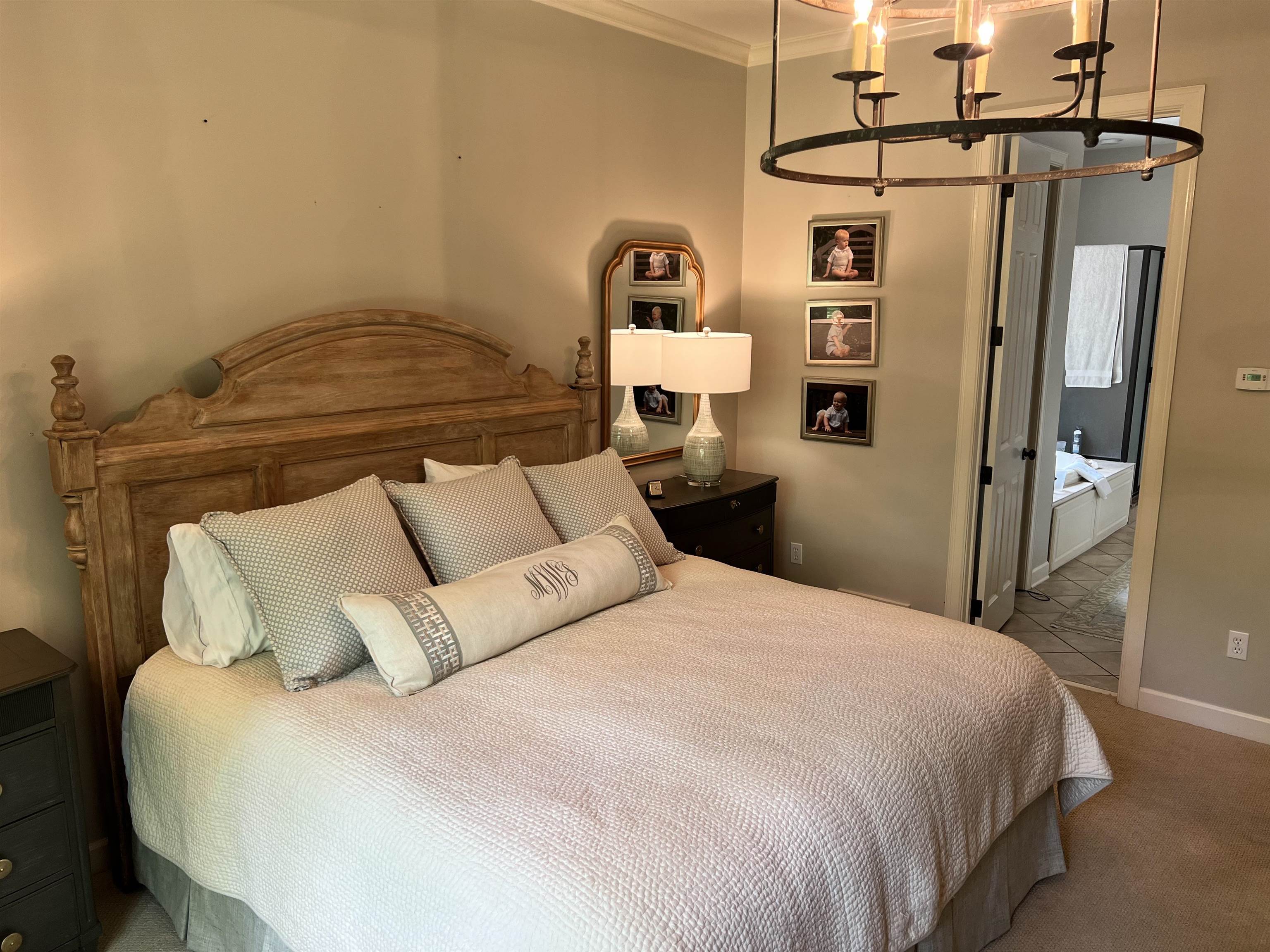 5110 Barry Road Memphis, TN 38117 - Photo 19 of 25 a bedroom with a bed and a mirror