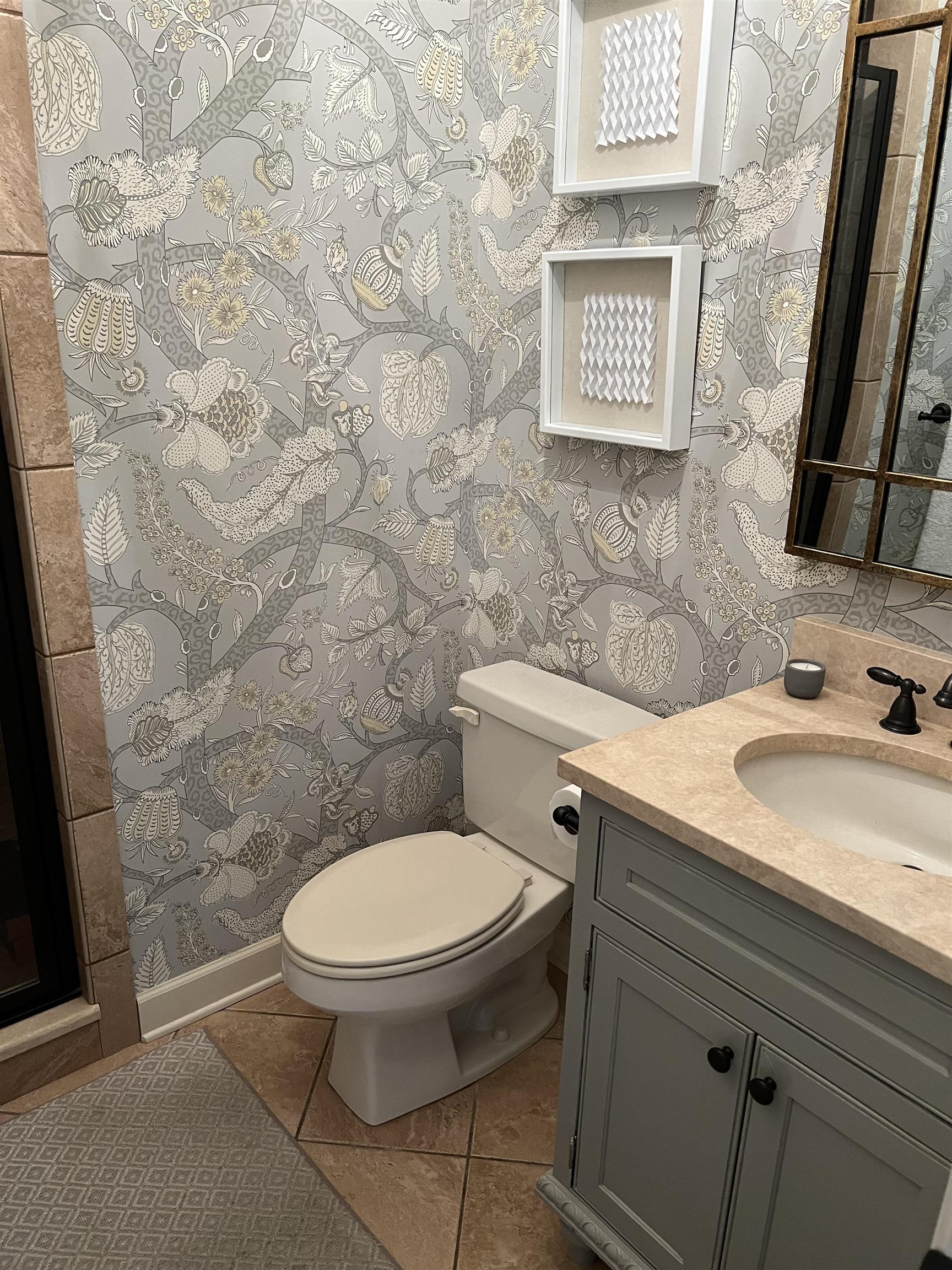 5110 Barry Road Memphis, TN 38117 - Photo 9 of 25 a bathroom with a toilet and a sink