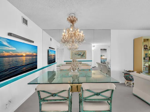 a view of a balcony and a floor to ceiling window