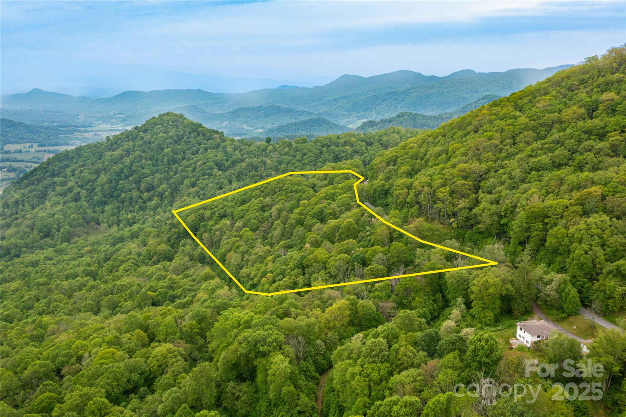 999 Mount Soma Boulevard Clyde, NC 28721 - Photo 2 of 10 a view of a tennis court