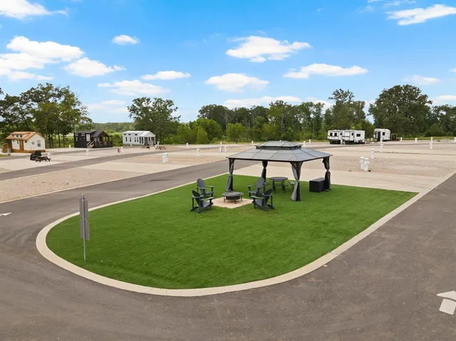a view of a swimming pool with a yard