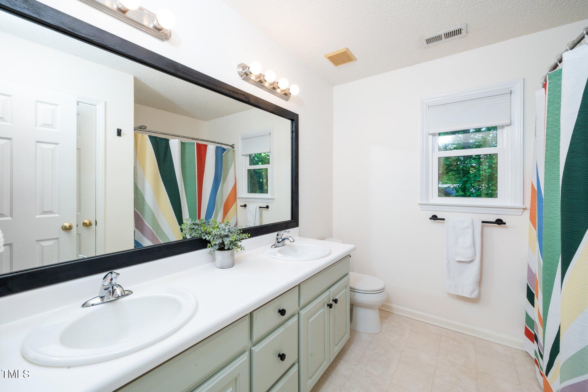 8009 Tobin Place Raleigh, NC 27612 - Photo 20 of 29 Hall Bath