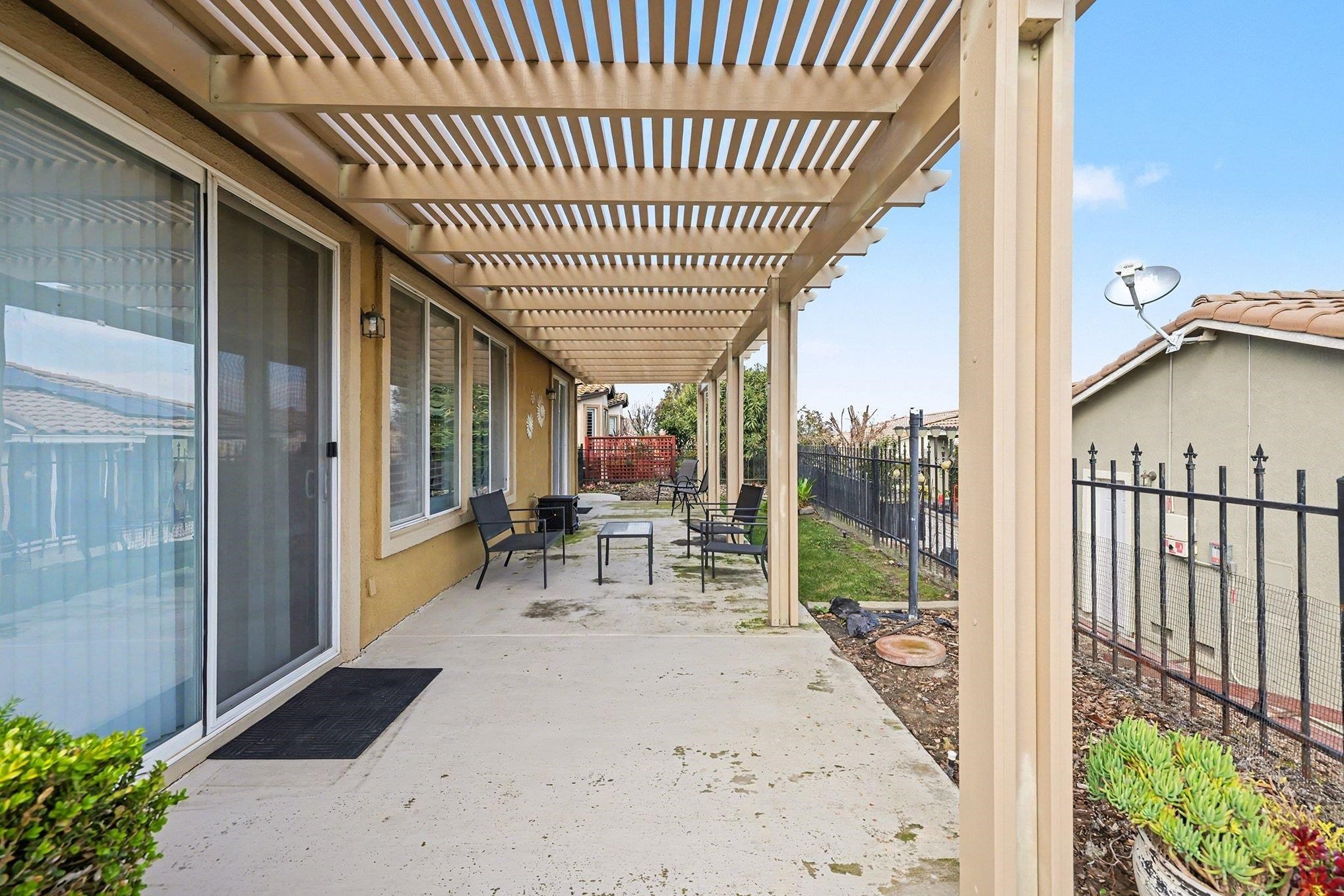 369 Whistling Straits Way Rio Vista, CA 94571 - Photo 19 of 28 a view of porch with a table and chairs