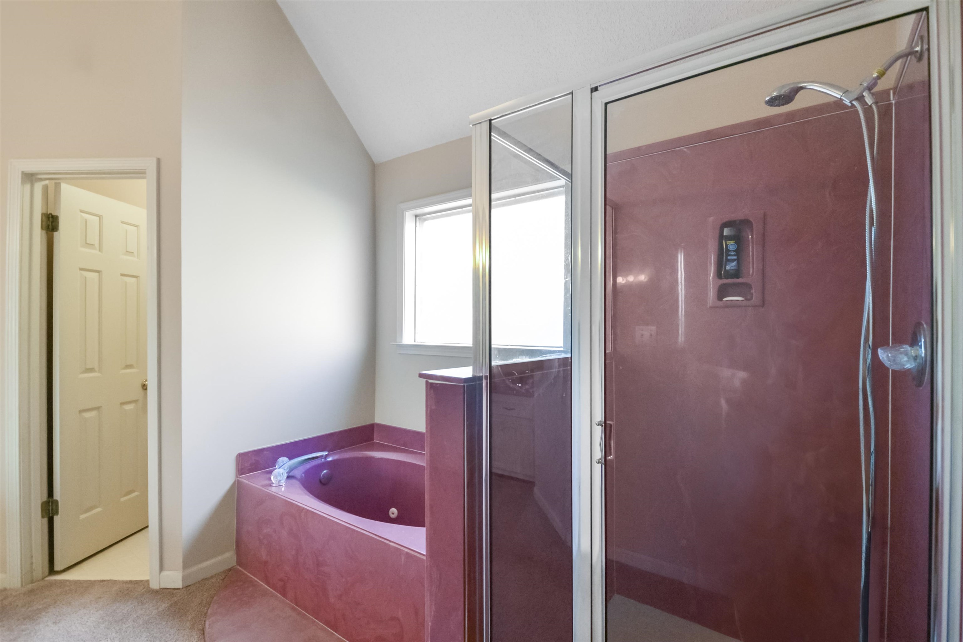 1441 Milestone Circle Collierville, TN 38017 - Photo 11 of 27 a bathroom with a tub shower and window