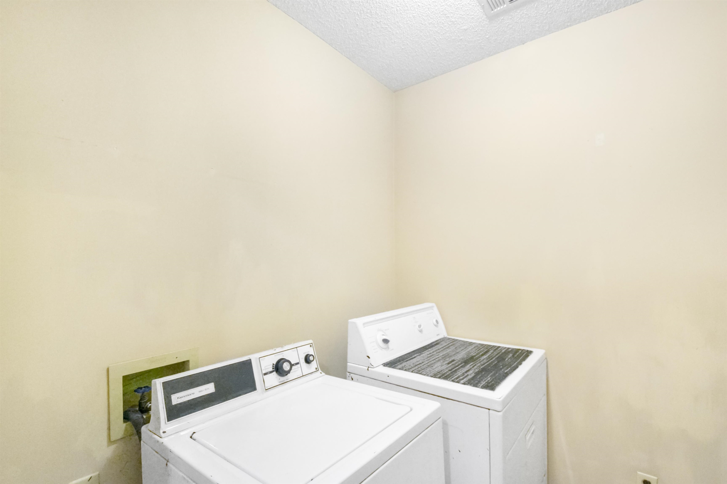 1441 Milestone Circle Collierville, TN 38017 - Photo 19 of 27 a utility room with dryer and washer